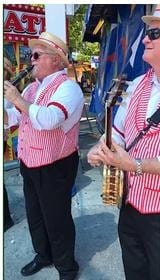 Razzmajazz musicians performing at outdoor event