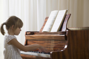 Little girl playing piano
